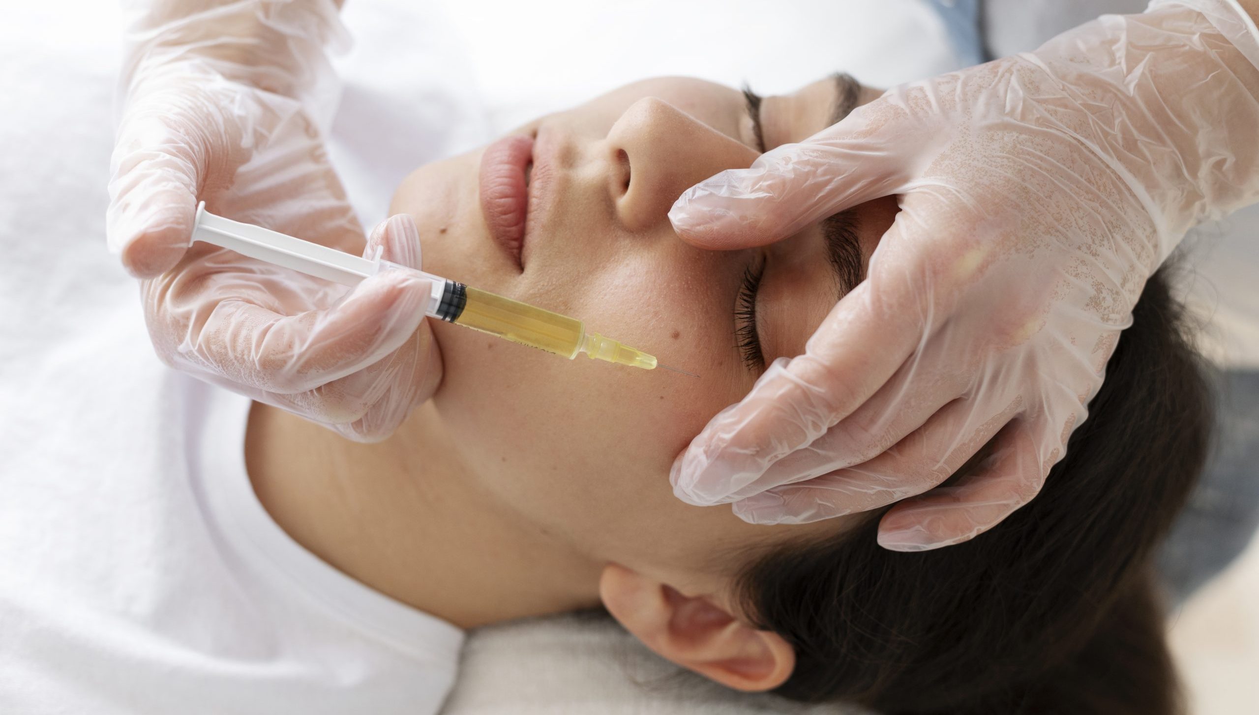 High-angle-young-woman-getting-prp-treatment